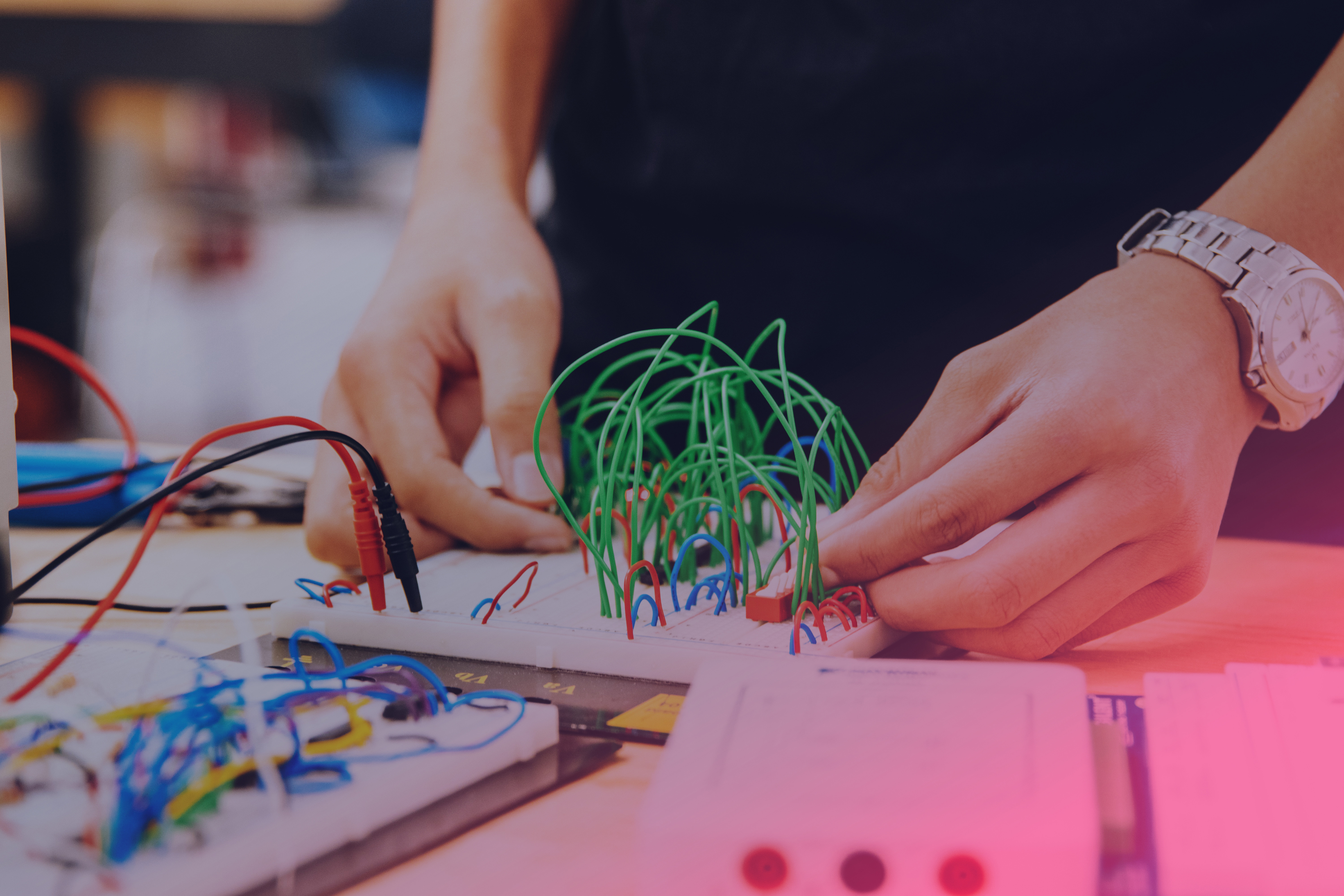 One person works with cables.