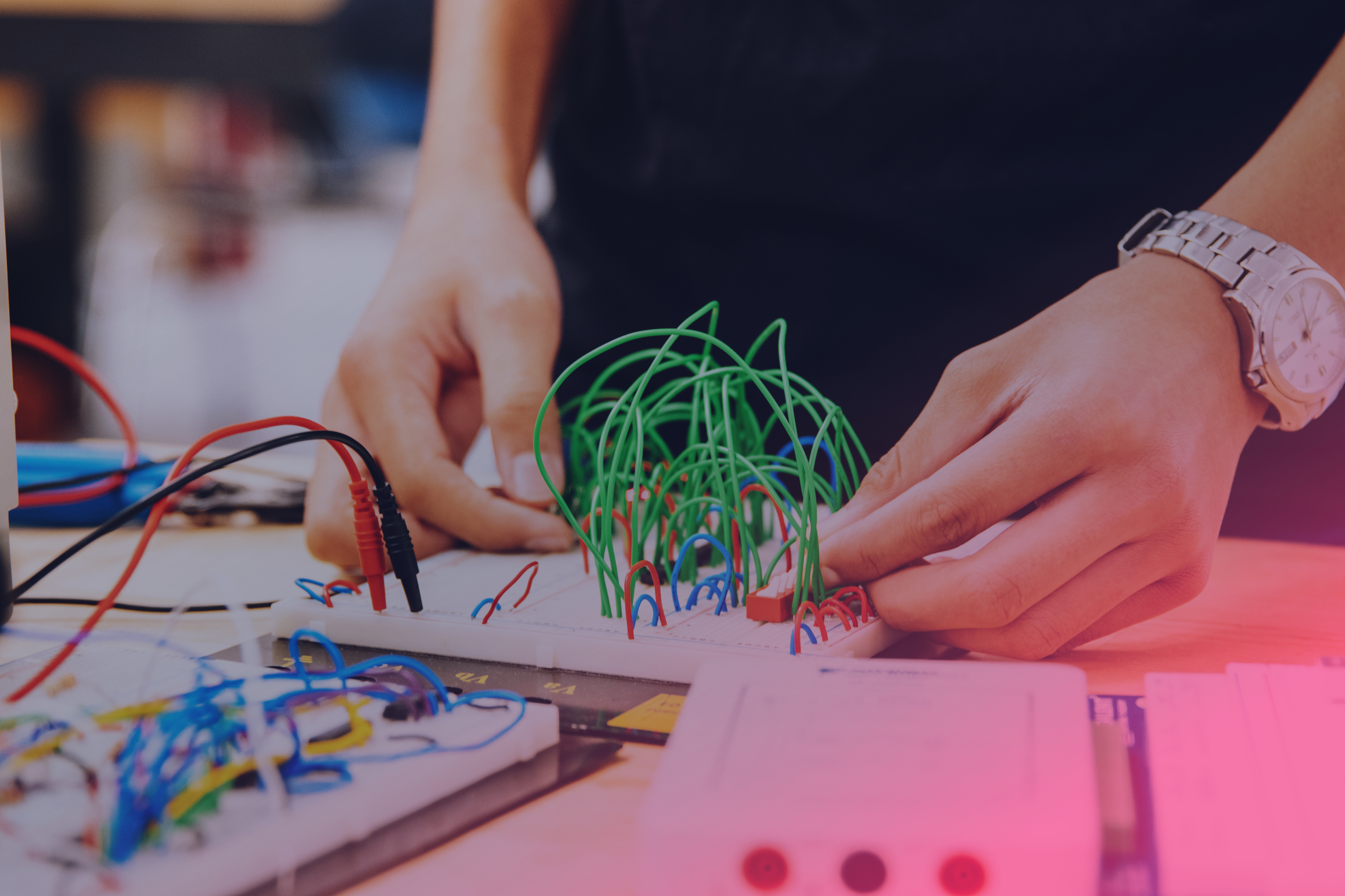 One person works with cables.